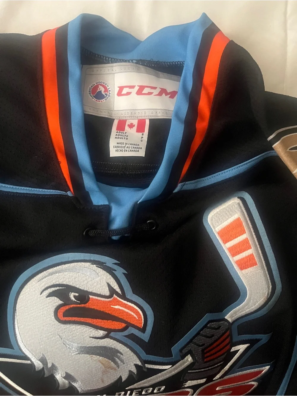 Men’s Small - Black, Light Blue & Orange Hockey Jersey  Gulls